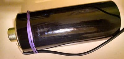 2-inch speaker glued to length of PVC pipe to make a resonant speaker.