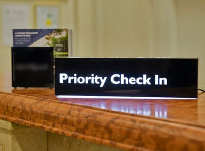 Priority check-ins sign