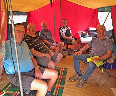 5 radio hams in tent during 2024 Field Day operation at ZL3RR