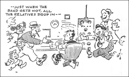 Cartoon shows ham in shack with caption 'Just when the bands get hot, all the relatives drop in."